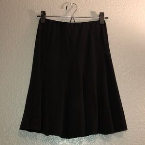 Knee length black skirt